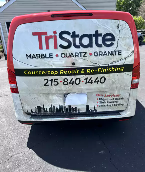 Tri-State Countertop Repair technician restoring a stone countertop in Pennsylvania
